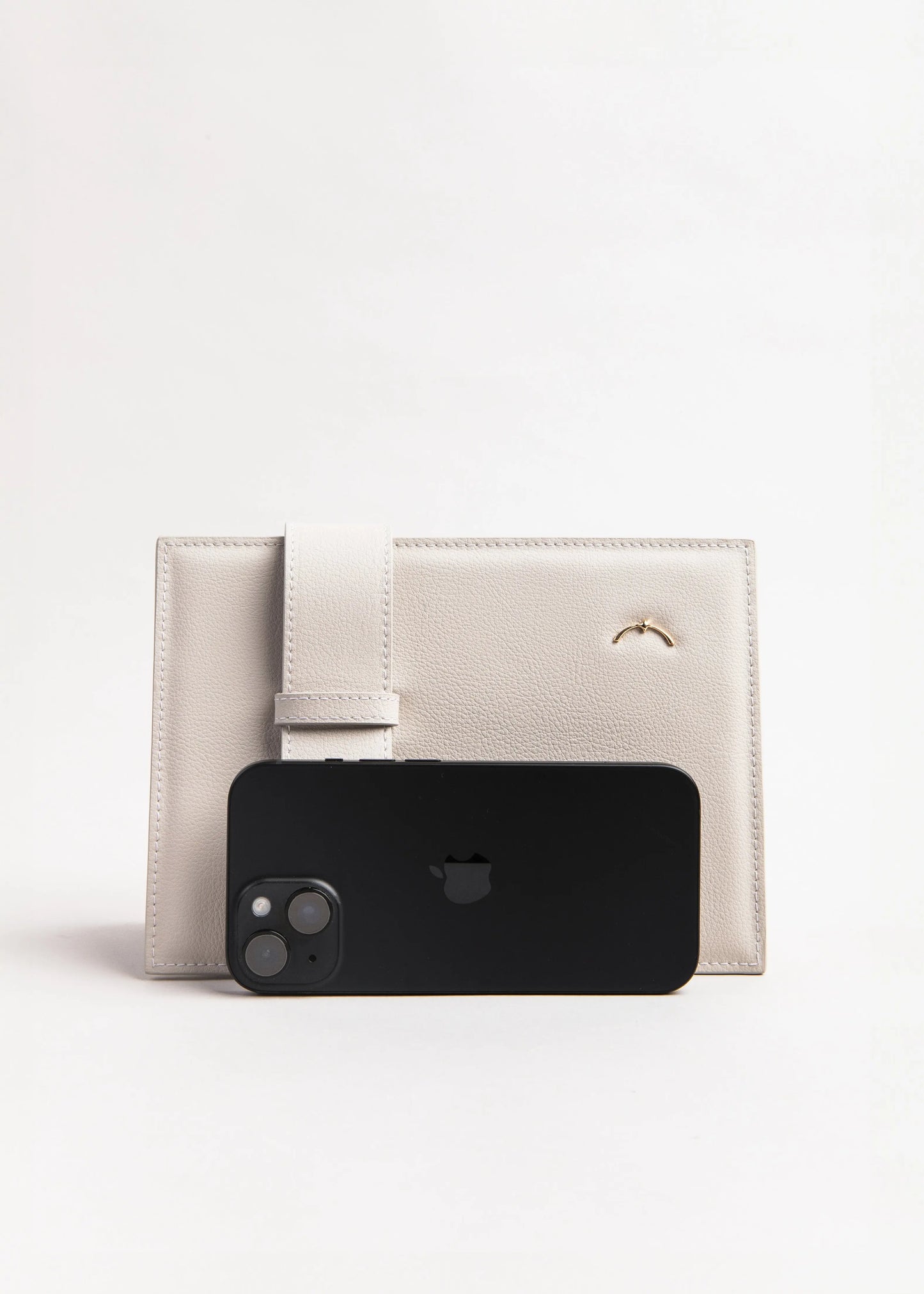 Qosmic Elara Moonstone - cream handbag - with an iphone 14 max pro