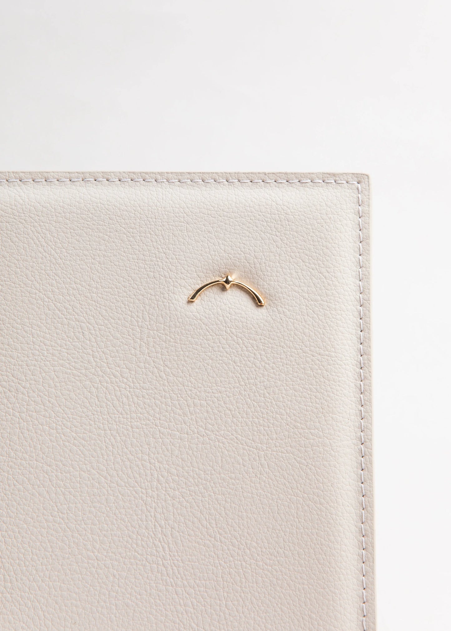 Qosmic Elara Moonstone - cream handbag - Symbol detail